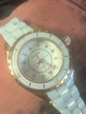 Women's Stauer Ceramic White and Gold Analog Watch With Iced Out Dial